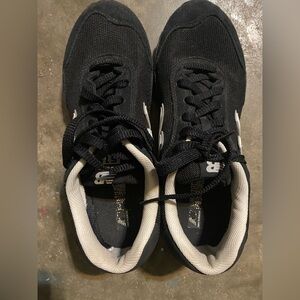 Black and White New Balance Tennis Shoes